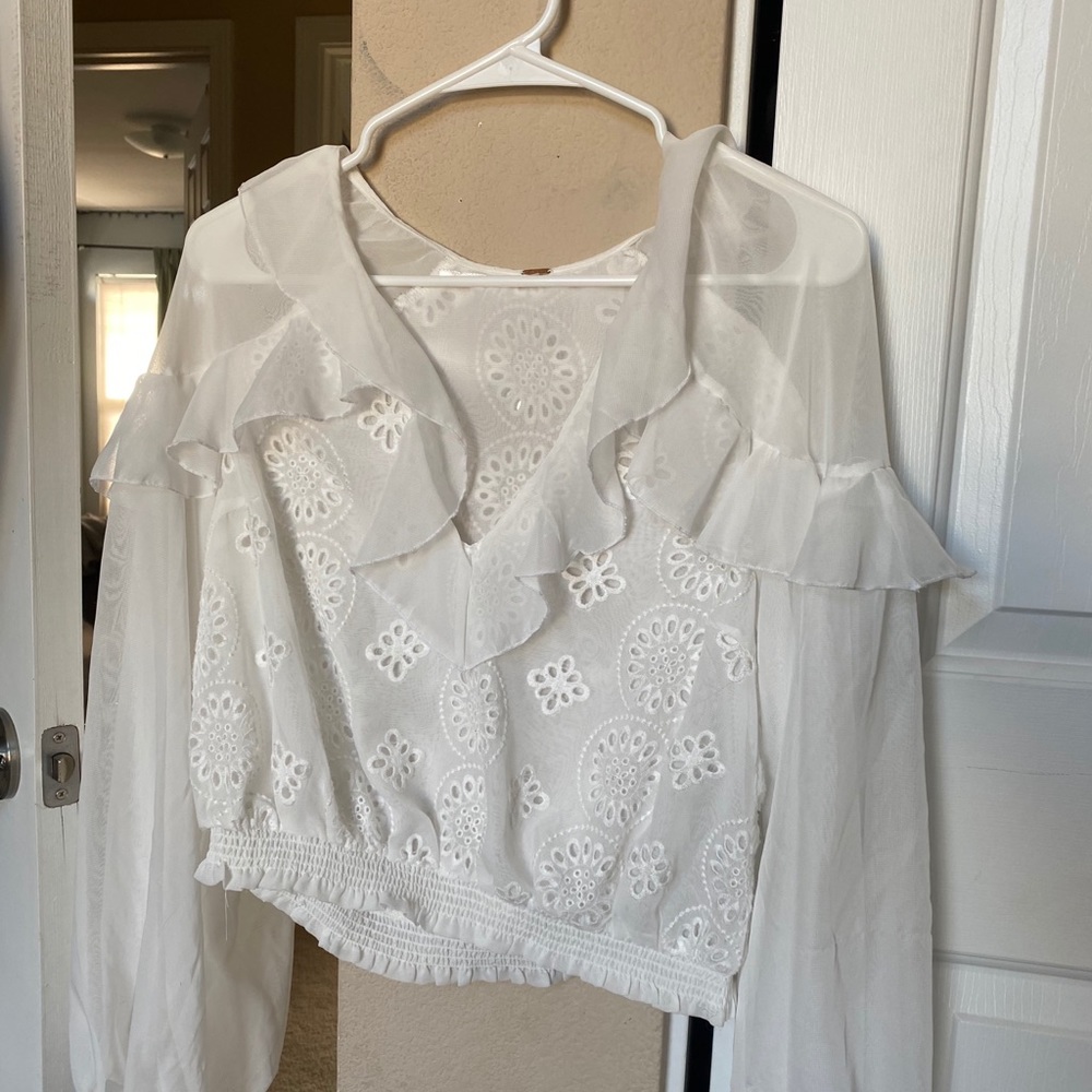 Free people. White puffy, see through shirt